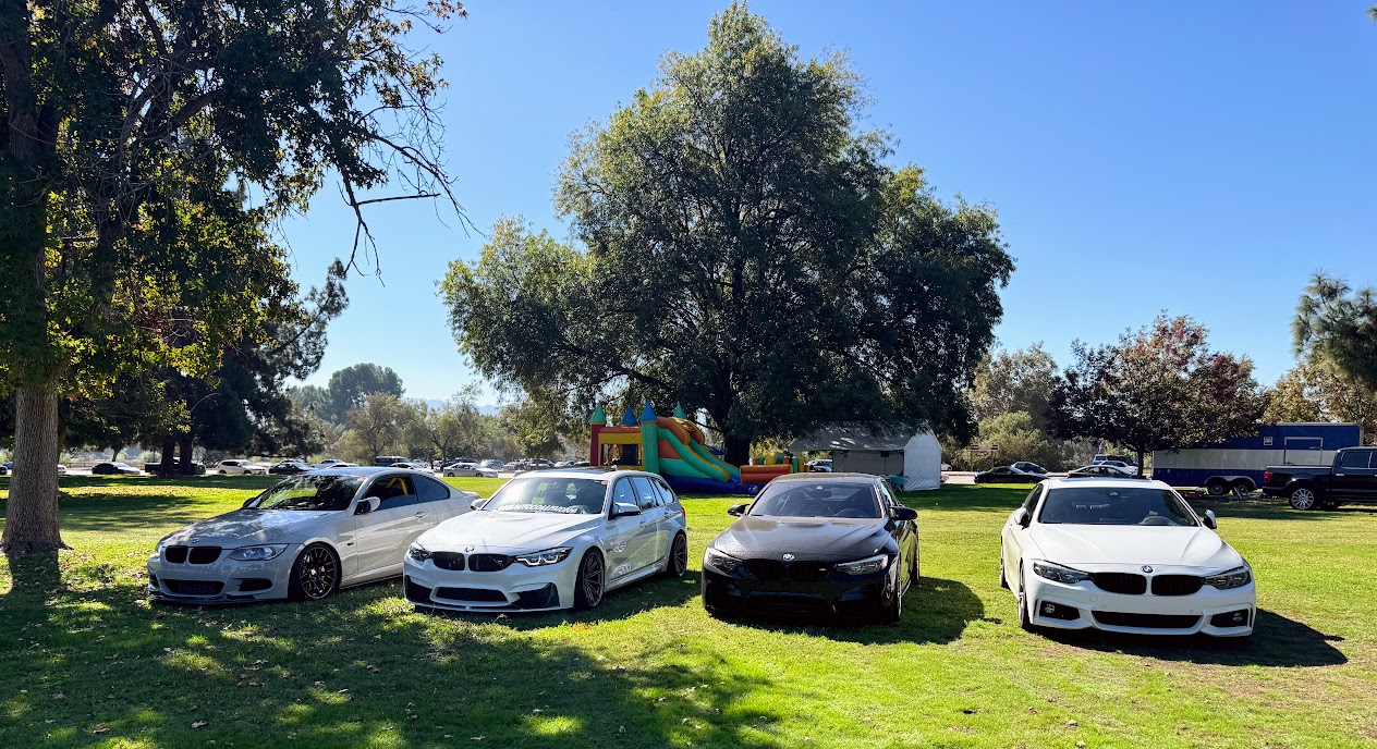 BMW lineup on display at the SoCal Vintage BMW Show, representing US Auto Collisions of Burbank, California.