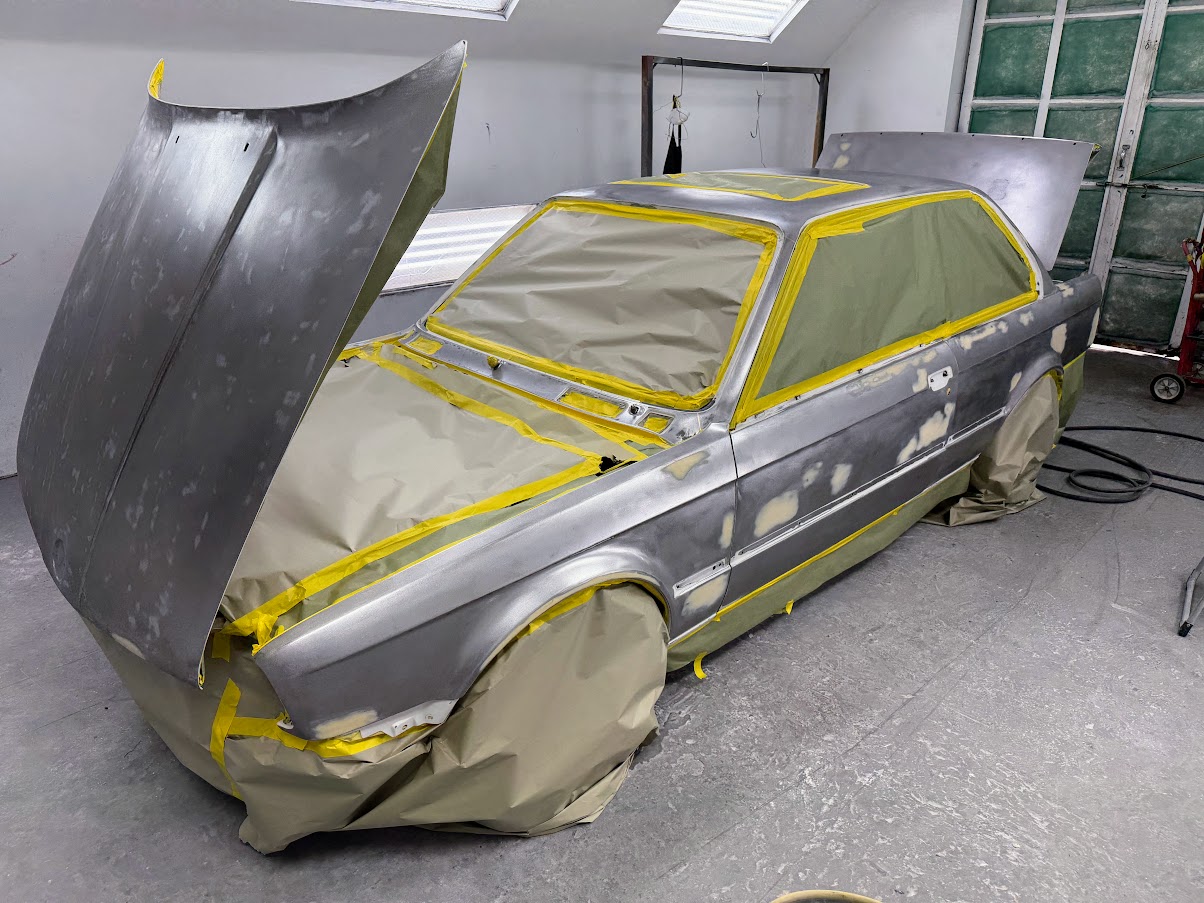 1990 BMW 325 E30 masked for refinishing at US Auto Collision Center in Burbank
